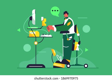 Young guy working at the computer at the table