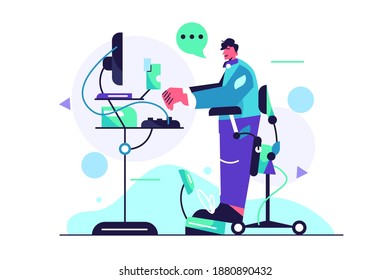Young guy working at the computer at the table