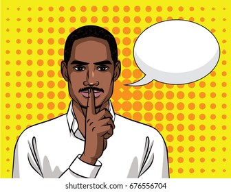 Young handsome guy Afro American type  holding a finger near his mouth. Face of man with speech bubble over halftone background effect. Man wants to keep the secret