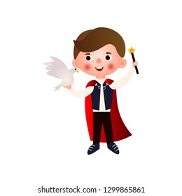 A young handsome magician rehearsing his stunts for his performance. The boy in the clothing of a magician.