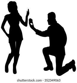 young handsome man making proposal of marriage, but young woman is refusing him