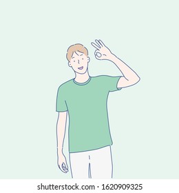 Young handsome man smiling positive doing ok sign with hand and fingers.Eps10 vector.