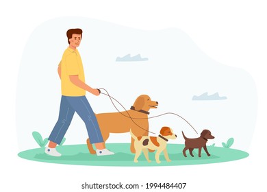 A young handsome man walks with a dog. Recreation and leisure with his pets.