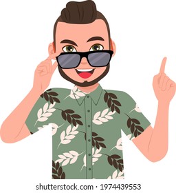 Young handsome man wearing fashion sunglasses and cool shirt pointing finger up