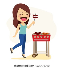Young happy caucasian woman preparing sausages on grill barbecue
