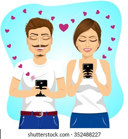 young happy couple sending love messages using cellphone wireless communications