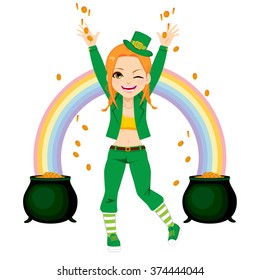 Young happy girl dressed with leprechaun costume sharing golden coins money