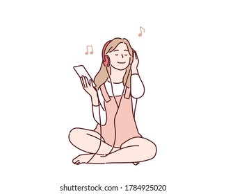 Young happy girl sitting on floor and listening music. Hand drawn style vector design illustrations.