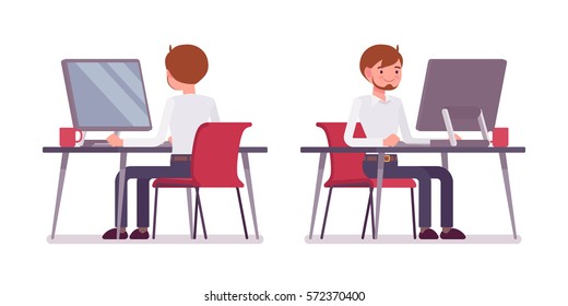 Young happy male clerk sitting at the desk and working at the computer, looking at screen, rear and front view, comfortable workspace, friendly office, effective employee, organized manager