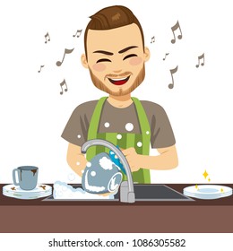 Young happy man wearing apron washing dirty dishes singing