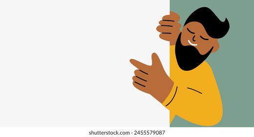 Young Arab man happy positive smile point finger empty copy space billboard ad advice choice isolated over white colour background
