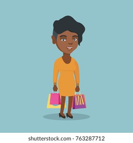 Young happy smiling african-american woman holding shopping bags. Full length of cheerful woman standing with a lot of shopping bags. Vector cartoon illustration. Square layout.
