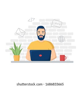Young happy smiling man is sitting with laptop.Around the Internet, email, message icons. Remote work, e-learning, home office. Freelancer programmer with a laptop. Vector illustration