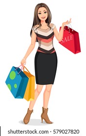 young happy smiling woman with shopping bags