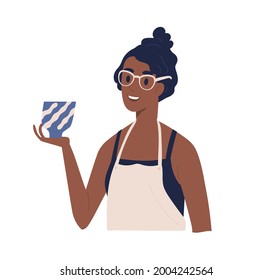 Young happy woman in apron looking and admiring ceramic pot in hand. Smiling satisfied female potter. Worker with modern pottery. Flat vector illustration of cheramist isolated on white background