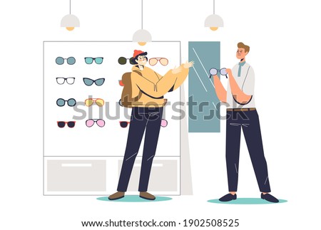 Young hipster man in optics store trying fashionable eyeglasses with male shop assistant. Cartoon guy choosing glasses. Flat vector illustration