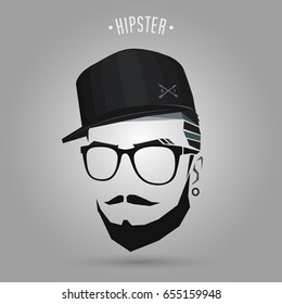 Young hipster wearing cap design on gray background