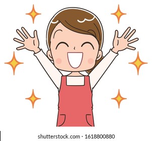 Young housewife wearing red apron.She has a happy look.