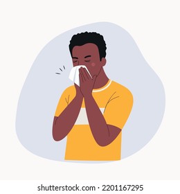 Young ill man with dark skin blows his nose in a handkerchief isolated. Vector flat style cartoon illustration