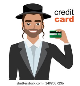 Young jew man smiling, showing, presenting credit card for making paymen.