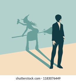 Young lady casting shadow of flying witch with a broomstick and raven