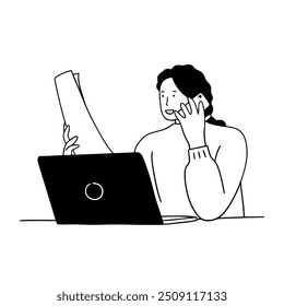 Young lady working on laptop while making call