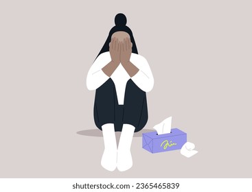 A young, lonely character sits on the floor covering their face, beside them, a box of tissues stands ready for comfort
