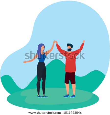 young lovers couple celebrating in the park