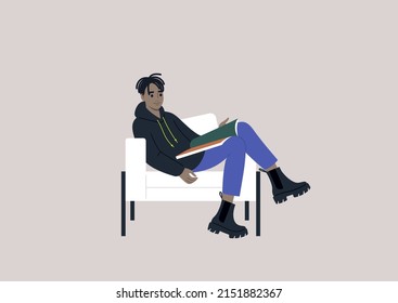 A young male African character leafing through a magazine in a designer chair