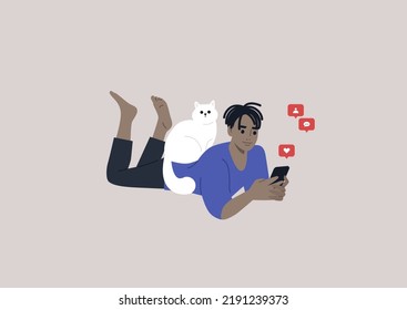 A young male African character lying on their stomach and checking their mobile phone notifications, a cat sitting on their back