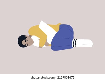 A young male Asian character squeezing a pillow, grief and sorrow concept, depression and anxiety
