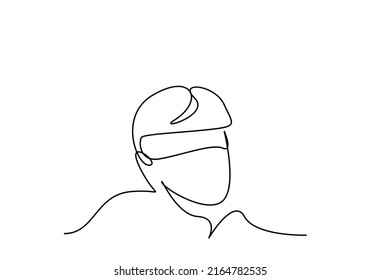 A young male blindfolded with a cloth. a person wearing a sleeping eye patch
