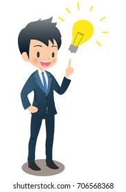 The young male businessman dressed in the suit considers