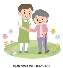 Young male caregiver assisting an elderly woman with a cane
