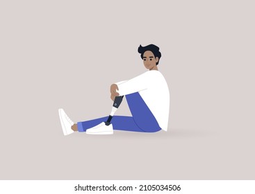 A young male Caucasian character with a prosthetic leg sitting on a floor