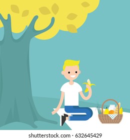 Young male character having a picnic under the tree / flat editable vector illustration, clip art