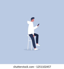 Young male character sitting on the bar stool and holding a smartphone. Millennial lifestyle. Social media. Flat editable vector illustration, clip art