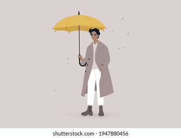 A young male character wearing an oversize coat and holding a yellow umbrella, a rainy weather concept