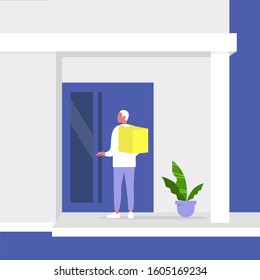 Young male courier standing next to a front door, building entrance, residential property, food delivery service