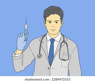 young male doctor with stethoscope dressed in uniform standing and showing a syringe