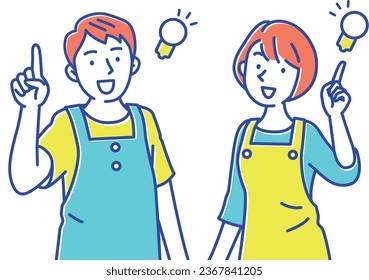 Young male and female caregivers wearing aprons come up with a good idea