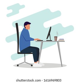 Young male manager sitting at the computer. Modern design. Office worker. Interior. Desk and chair. Side view.Millennial lifestyle, daily routine.