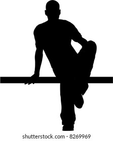 Young male model silhouette sitting on the bench