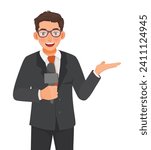 Young male reporter holding microphone working reporting news
