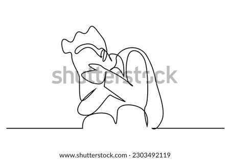 young man  ashamed he puts his hand to his face hiding