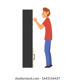 Young Man Assembling New Cupboard, Manual Furniture Assembly Vector Illustration