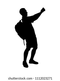 Young man with backpack and cellphone in hand silhouette vector