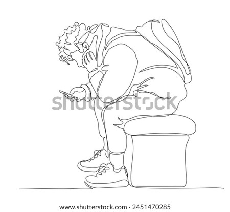 Young man with backpack sitting on bench and using phone. Side view. Continuous line drawing. Black and white vector illustration in line art style.