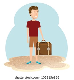 young man in the beach with suitcase