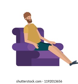 young man with beard seated in the sofa